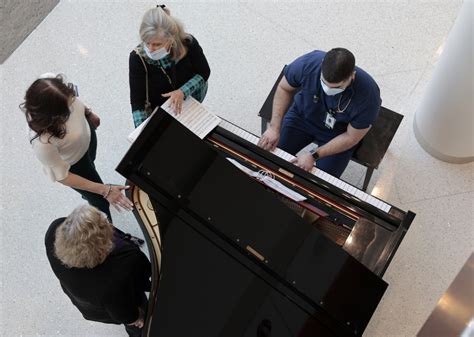 Healing starts in the lobby at this hospital, where volunteer musicians play their passion